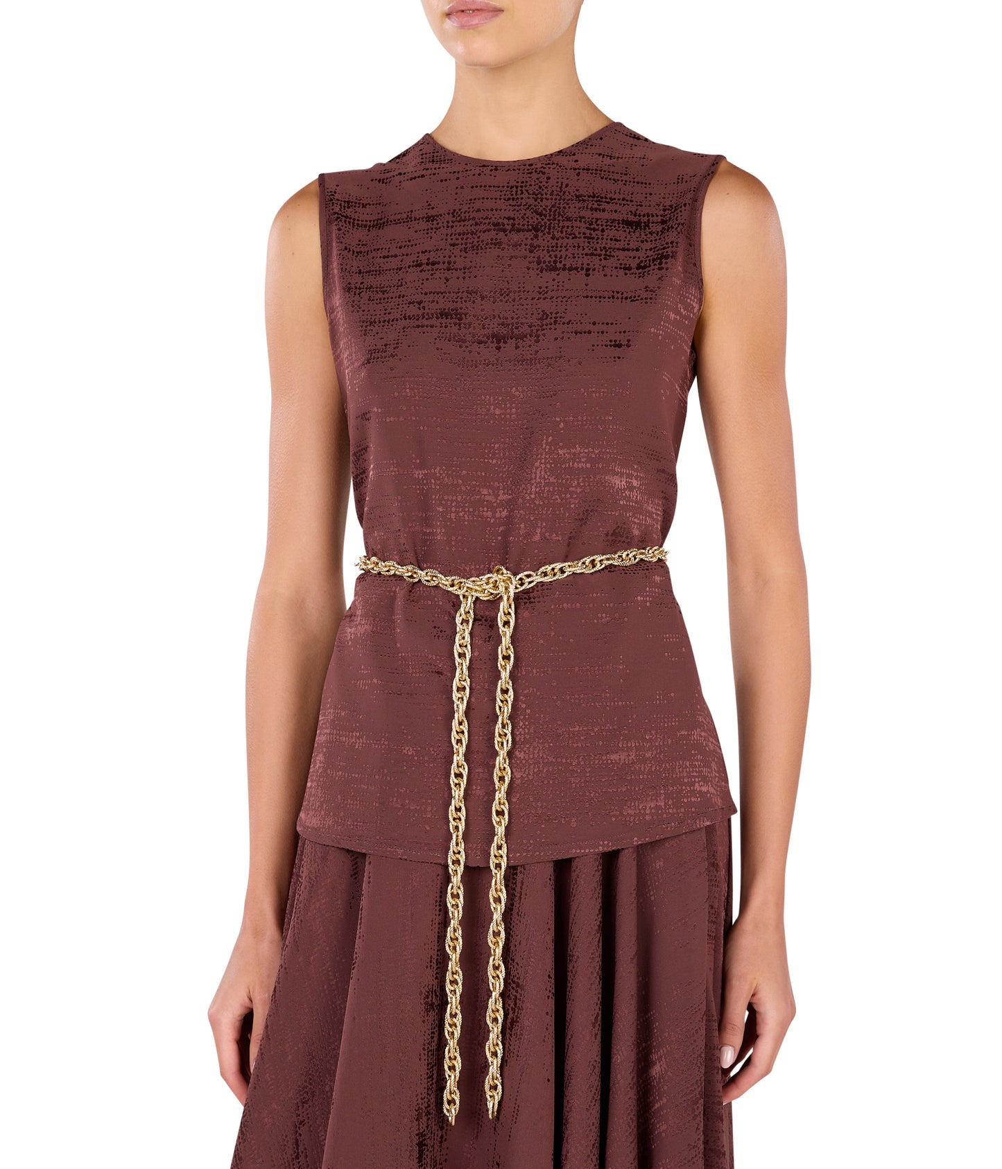 Sleeveless Top With Flare Skirt Styled With Belt